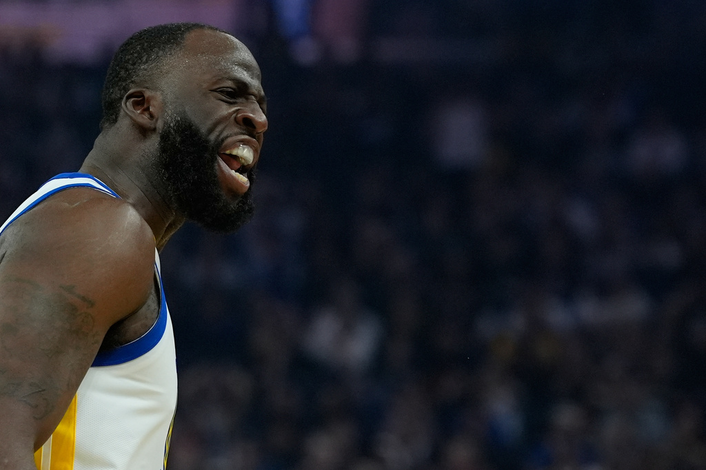 Golden State Warriors forward Draymond Green reacts after making a 3-point basket during the first half of an NBA basketball game against the Houston Rockets, Sunday, April 5, 2026, in San Francisco. (AP Photo/Godofredo A. Vásquez)