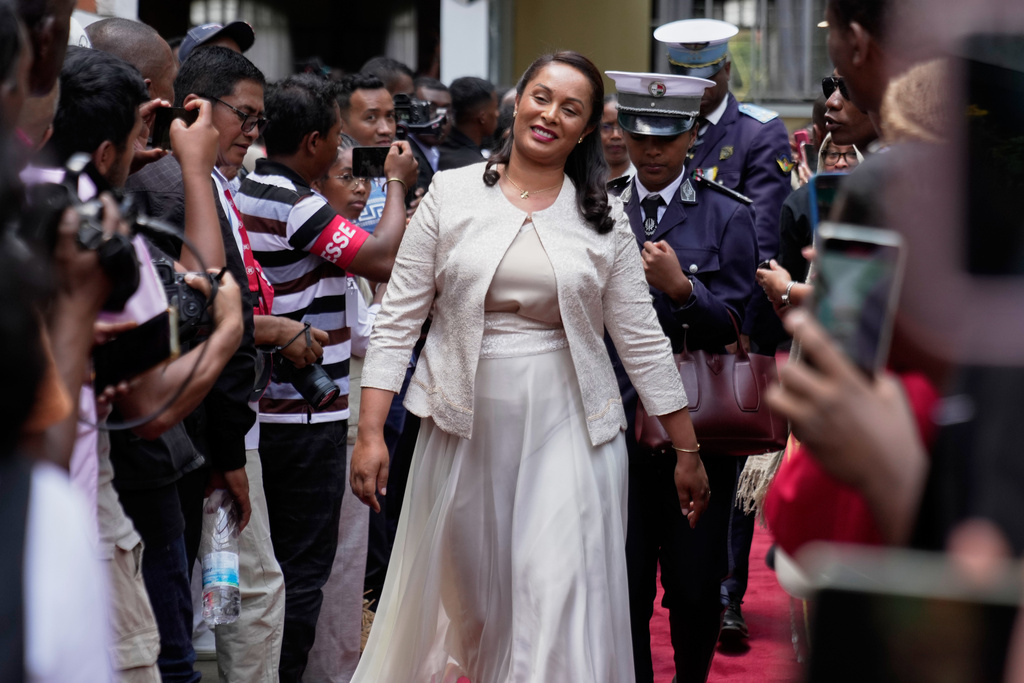 Ramatoa Elisa Randrianirina arrives for her husband Col. Michael Randrianirina's swearing-in as president, at the High Constitutional Court in Antananarivo, Madagascar, Friday, Oct. 17, 2025. (AP Photo/Brian Inganga)
