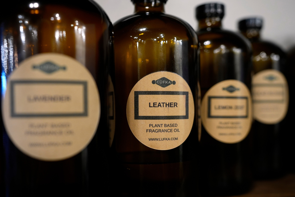 Refillable bottles at Lufka Refillable Zero Waste store sit on a shelf on Wednesday, Feb. 18, 2026, in Tampa, Fla. (AP Photo/Chris O'Meara)