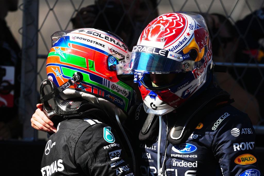 Red Bull driver Max Verstappen of the Netherlands, right, congratulates Mercedes driver Andrea Kimi Antonelli of Italy winning the Spanish Formula One Grand Prix race in Madrid, Sunday, Sept. 13, 2026. (AP Photo/Manu Fernandez)