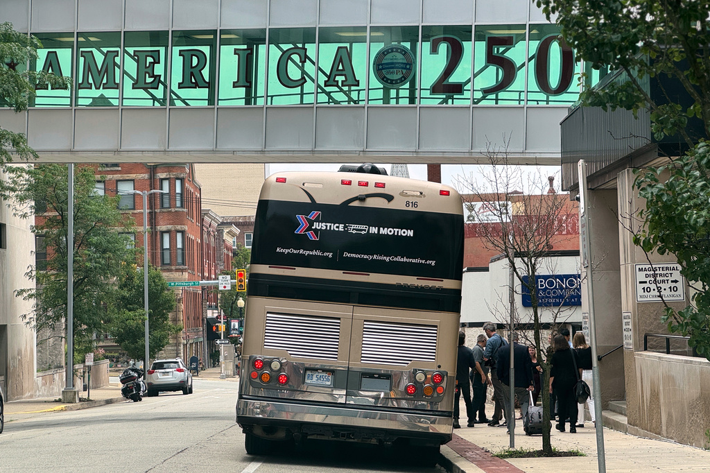A tour bus carrying retired judges on a tour through the Rust Belt to defend judicial independence is parted outside the Westmoreland County Courthouse in Greensburg, Pa., on Tuesday, July 7, 2026. (Keep Our Republic via AP)