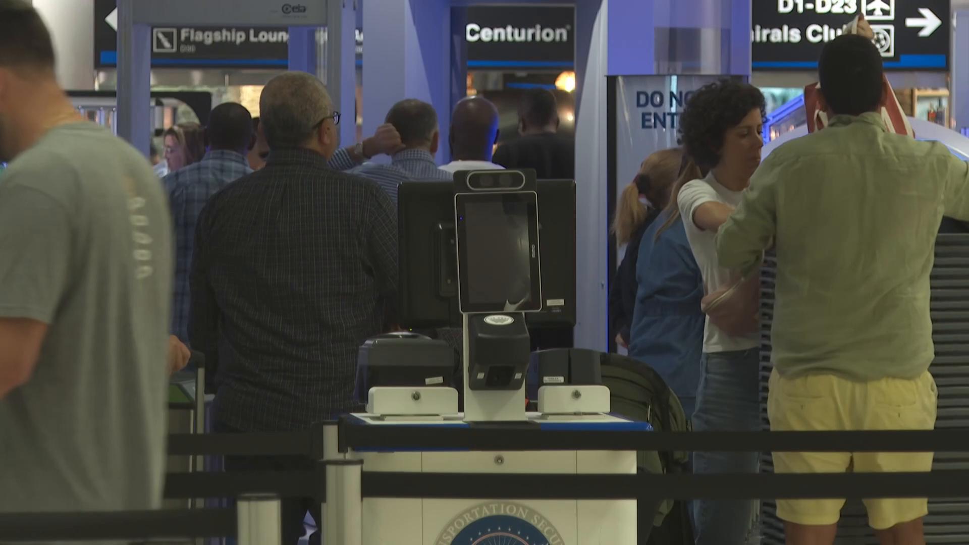 Travelers at Miami International Airport hope the government opens soon as hundreds of flights in the U.S. are being scratched this weekend.  (AP Video by Cody Jackson)