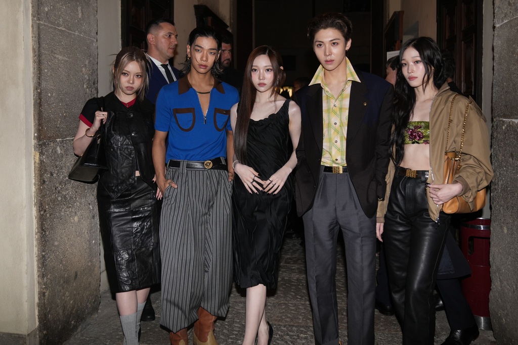 CORRECTS ALLAY TO ALLDAY - Members of the AllDay Project, ADP, a South Korean group, from left, Bailey, Tarzzan, Youngseo, Woo-chan and Annie arrive for the Versace Intimate fashion event in Milan, Friday, Sept. 26, 2025. (AP Photo/Antonio Calanni)