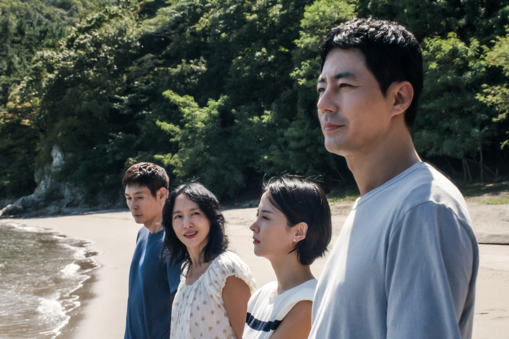 This image released by Netflix shows, from left, Sul Kyung-gu as Ho-seok, Jeon Do-yeon as Mi-ok, Cho Yeo-jeong as Ye-ji, and Zo In-sung as Sang-woo in a scene from "Possible Love." (Netflix via AP)