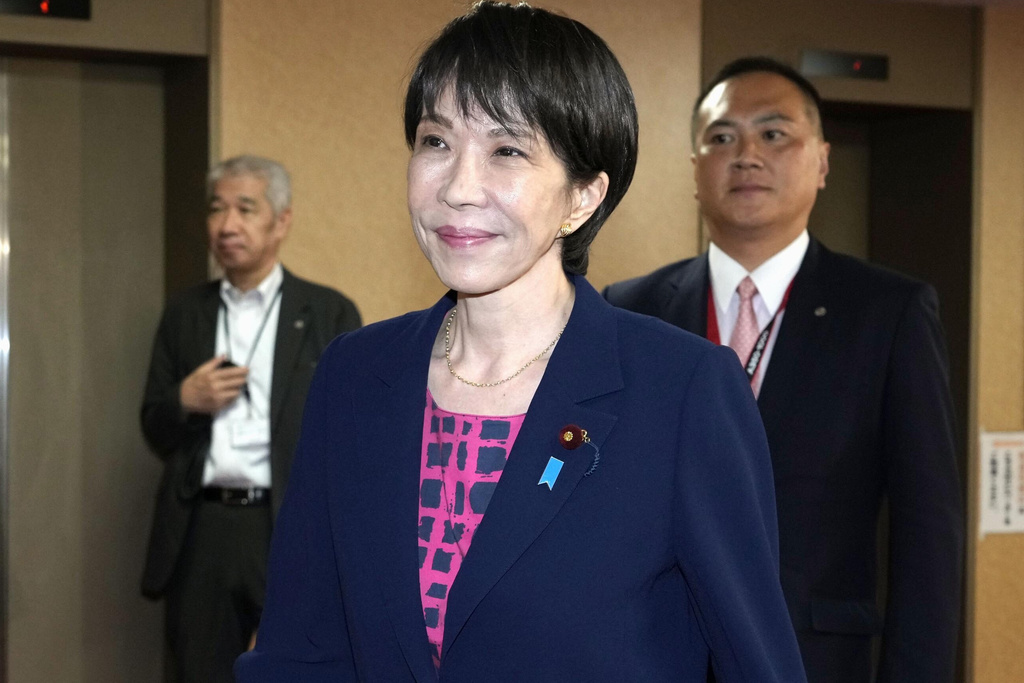 Sanae Takaichi, the newly-elected leader of Japan's ruling party, the Liberal Democratic Party (LDP), leaves the LDP headquarters in Tokyo, Friday, Oct. 10, 2025. (Keisuke Hosojima/Kyodo News via AP)