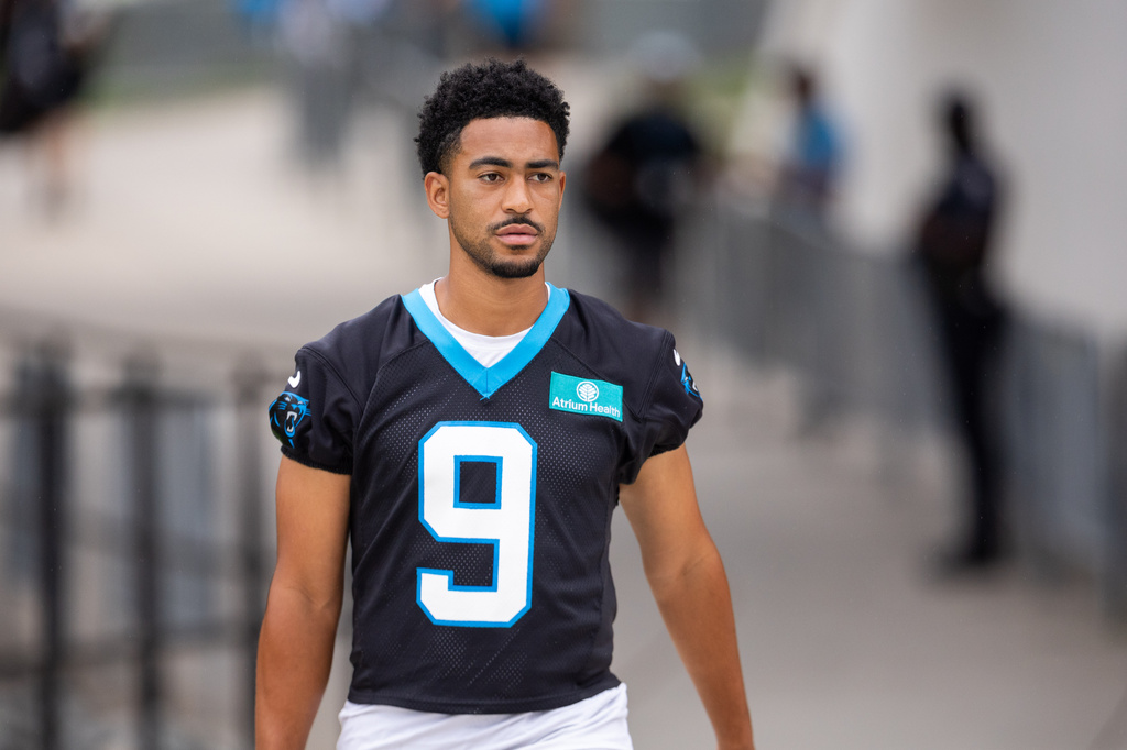 Carolina Panthers quarterback Bryce Young (9) walks to the field during the NFL football team's training camp Thursday, July 23, 2026, in Charlotte, N.C. (AP Photo/Scott Kinser)