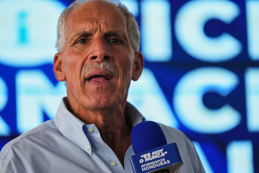 Presidential candidate Nasry Asfura, of the National Party, gives a press conference in Tegucigalpa, Honduras, Monday, Dec. 1, 2025. (AP Photo/Moises Castillo)