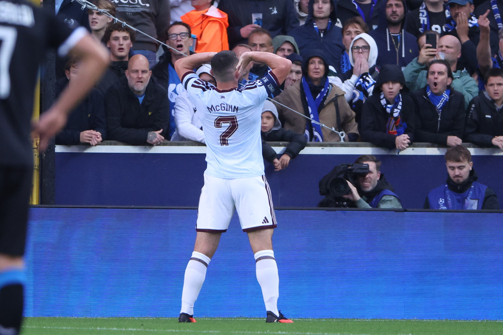 Aston Villa's John McGinn celebrates after scoring his side's first goal during the Champions League opening phase soccer match between Club Brugge and Aston Villa in Bruges, Belgium, Tuesday, Sept. 8, 2026. (AP Photo/Omar Havana)