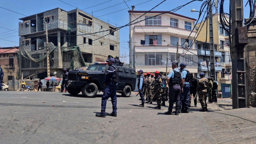 Security forces and military officers block access to the square for protesters in Antananarivo, Madagascar, Thursday, Sept. 25, 2025. (AP Photo/Sarah Tetaud)