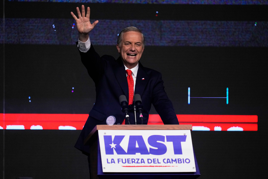 Presidential candidate Jose Antonio Kast of the Republican Party, waves to supporters after early results in the general elections in Santiago, Chile, Sunday, Nov. 16, 2025. (AP Photo/Esteban Felix)