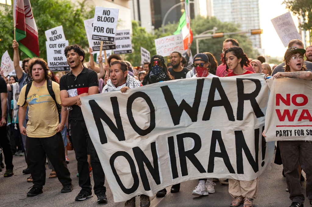 FILE - Protesters march in the streets of downtown Austin, Texas, to show opposition to the U.S.-Israeli war in Iran, during a demonstration organized by the Austin for Palestine Coalition, April 8, 2026. (Mikala Compton/Austin American-Statesman via AP, File)
