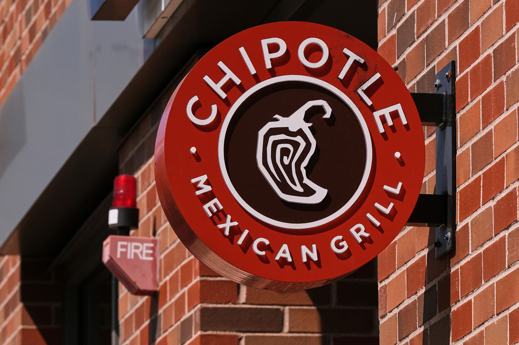 FILE - The Chipotle Mexican Grill logo is displayed at a store, Aug. 13, 2025, in Newton, Mass. (AP Photo/Charles Krupa, File)