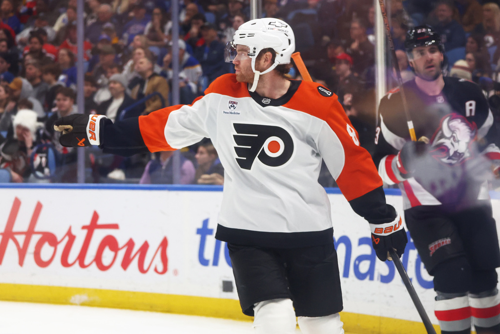 Philadelphia Flyers defenseman Cam York celebrates his goal during the second period of an NHL hockey game against the Buffalo Sabres, Thursday, Dec. 18, 2025, in Buffalo, N.Y. (AP Photo/Jeffrey T. Barnes)