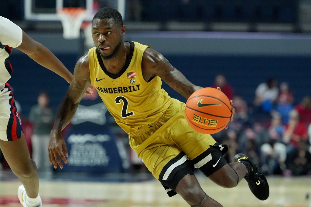 Vanderbilt guard Duke Miles (2) dribbles up court during the first half of an NCAA college basketball game against Mississippi, Tuesday, Mar. 3, 2026, in Oxford, Miss. (AP Photo/Rogelio V. Solis)