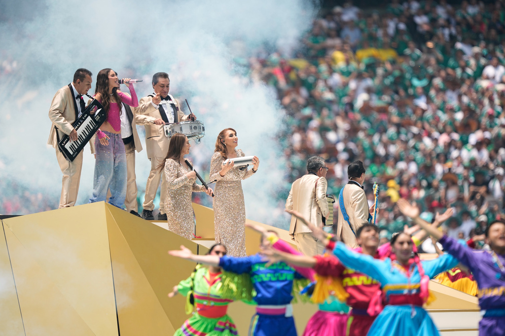 Mexican singer Belinda performs before the start of the World Cup Group A soccer match between Mexico and South Africa in Mexico City, Thursday, June 11, 2026. (AP Photo/Natacha Pisarenko)