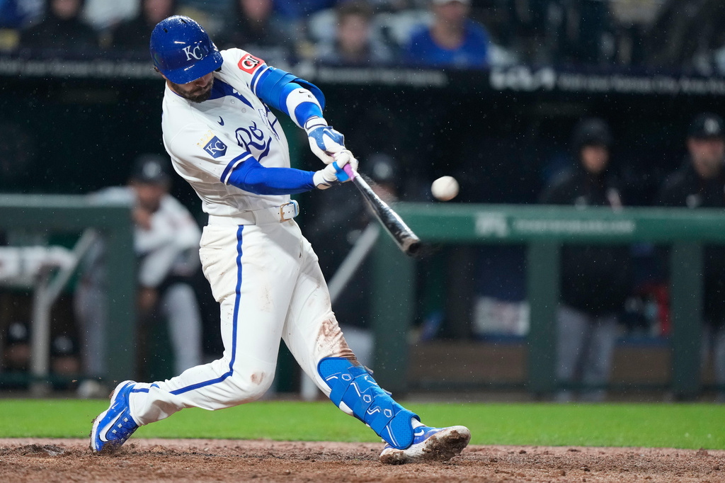 Kansas City Royals' Jonathan India hits a grand slam during the sixth inning of a baseball game against the Minnesota Twins, Wednesday, April 1, 2026, in Kansas City, Mo. (AP Photo/Charlie Riedel)