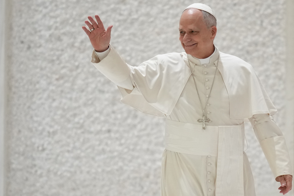 Pope Leo XIV arrives for his weekly general audience in the Pope Paul VI hall at the Vatican, Wednesday, Jan. 28, 2026. (AP Photo/Andrew Medichini)