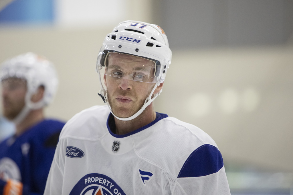 Edmonton Oilers' Connor McDavid (97) looks on during NHL hockey training camp in Edmonton, Alberta, Thursday, Sept. 18, 2025. (Amber Bracken/The Canadian Press via AP)