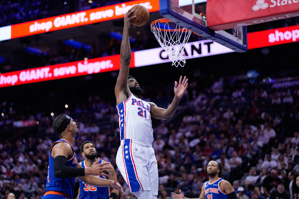 Philadelphia 76ers' Joel Embiid goes up for a dunk during the second half of Game 3 in a second-round NBA basketball playoff series against the New York Knicks Friday, May 8, 2026, in Philadelphia. (AP Photo/Matt Slocum)