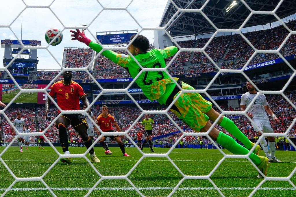 Egypt goalkeeper Mostafa Shoubir (23) makes a save during the World Cup Group G soccer match between Belgium and Egypt in Seattle, Monday, June 15, 2026. (AP Photo/Manu Fernandez)