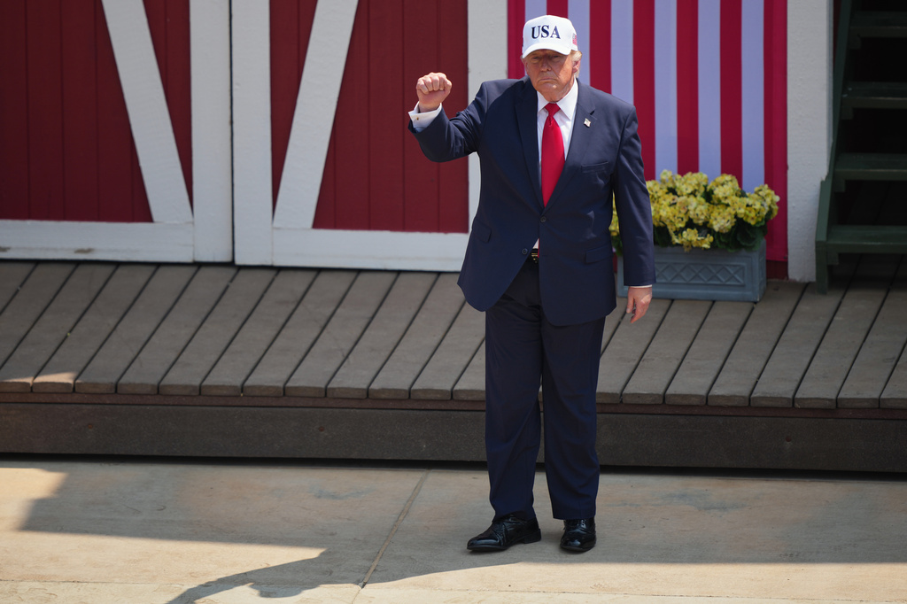 President Donald Trump leaves the stage after speaking at the Burning Hills Amphitheater during the Theodore Roosevelt Presidential Library opening ceremony Wednesday, July 1, 2026. (AP Photo/Matt Rourke)