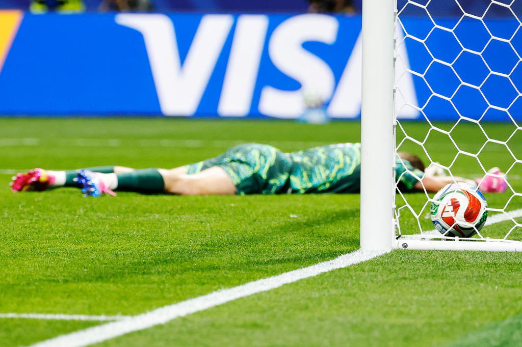 England goalkeeper Jordan Pickford lies on the pitch after Congo's Brian Cipenga scored his side's first goal during the World Cup round of 32 soccer match in Atlanta, Wednesday, July 1, 2026. (AP Photo/Erik S. Lesser)