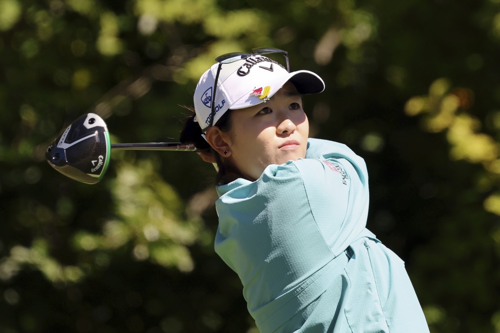 Rose Zhang, of the United States, tees off on the first hole during the final round of the FM Championship LPGA golf tournament at TPC Boston, Sunday, Aug. 31, 2025, in Norton, Mass. (AP Photo/Michael Dwyer)