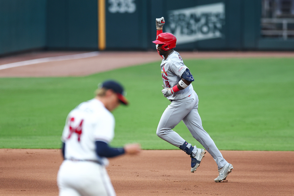 St. Louis Cardinals' Jordan Walker, right, reacts after hitting a three-run home run against Atlanta Braves pitcher Hurston Waldrep in the first inning of a baseball game, Thursday, July 2, 2026, in Atlanta. (AP Photo/Colin Hubbard)