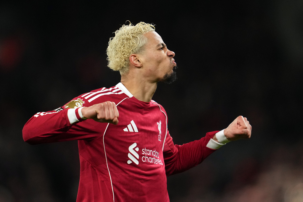 Liverpool's Hugo Ekitike celebrates after scoring his side's first goal during the English Premier League soccer match between Liverpool and Newcastle in Liverpool, England, Saturday, Jan. 31, 2026.(AP Photo/Jon Super)
