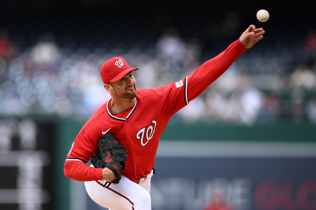 Washington Nationals starting pitcher Foster Griffin (22) throws during the first inning of a baseball game against the Los Angeles Dodgers, Sunday, April 5, 2026, in Washington. (AP Photo/Nick Wass)
