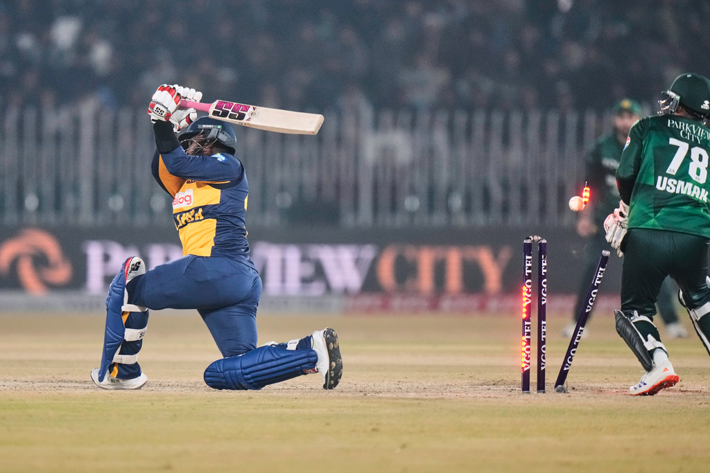 Sri Lanka's Wanindu Hasaranga is bowled out by Pakistan's Mohammad Nawaz during the final of tri-series T20 cricket match between Pakistan and Sri Lanka, in Rawalpindi, Pakistan, Saturday, Nov. 29, 2025. (AP Photo/Anjum Naveed)