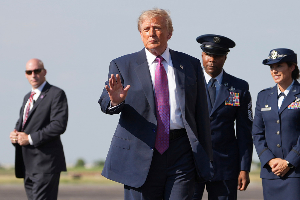 President Donald Trump arrives on Air Force One, Thursday, Aug. 27, 2026, at Ellington Airport in Houston. (AP Photo/Mark Schiefelbein)