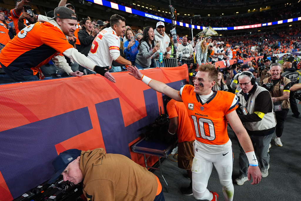 Denver Broncos quarterback Bo Nix celebrates following an NFL football game against the Kansas City Chiefs Sunday, Nov. 16, 2025, in Denver. (AP Photo/Jack Dempsey)