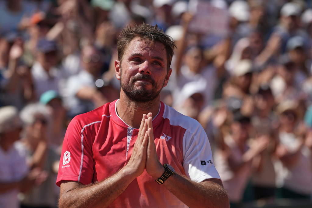 Stan Wawrinka of Switzerland reacts after the first round men's singles tennis match against Jesper De Jong of the Netherlands at the French Open tennis tournament in Paris, Monday, May 25, 2026. (AP Photo/Thibault Camus)