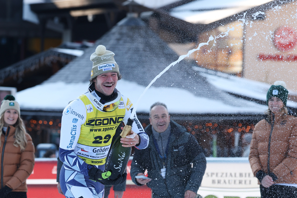 Czech Republic's Jan Zabystran celebrates winning an alpine ski, men's World Cup super-G, in Val Gardena, France, Friday, Dec.19, 2025. (AP Photo/Alessandro Trovati)