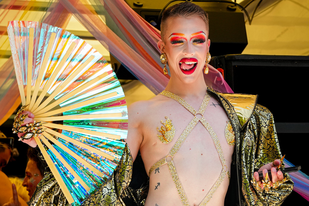 A person dances during the Zurich Pride parade in Zurich, Switzerland, Saturday, June 20, 2026. (AP Photo/Vadim Ghirda)