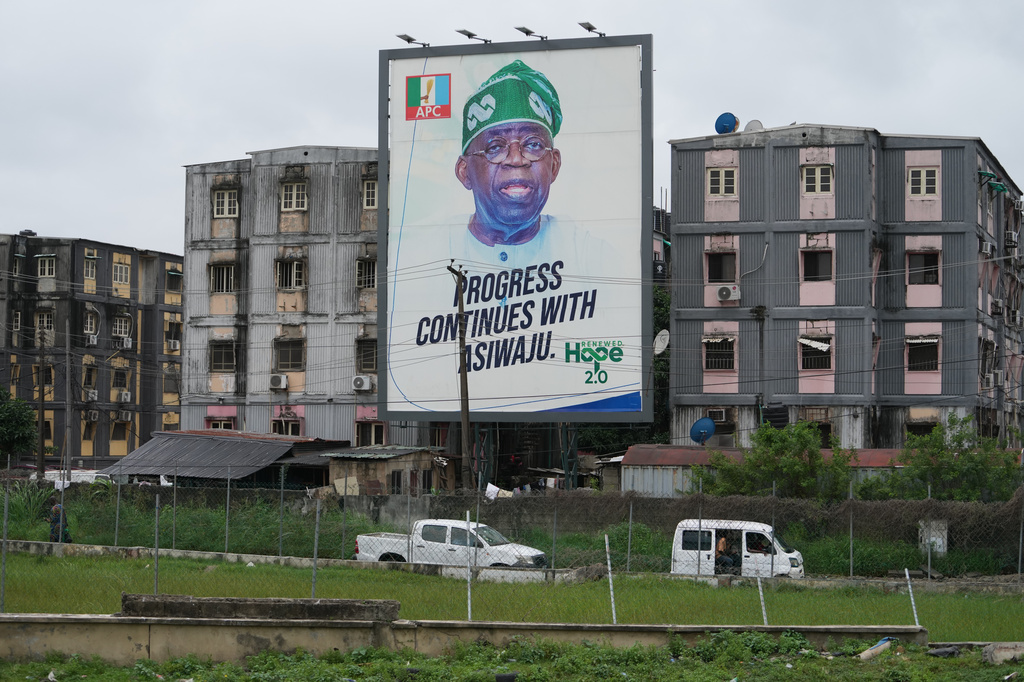 A giant poster of Nigerian incumbent president, Bola Tinubu, of the All Progressives Congress Party is seen on a building in Lagos, Nigeria, Tuesday, Aug. 18, 2026. (AP Photo/Sunday Alamba)