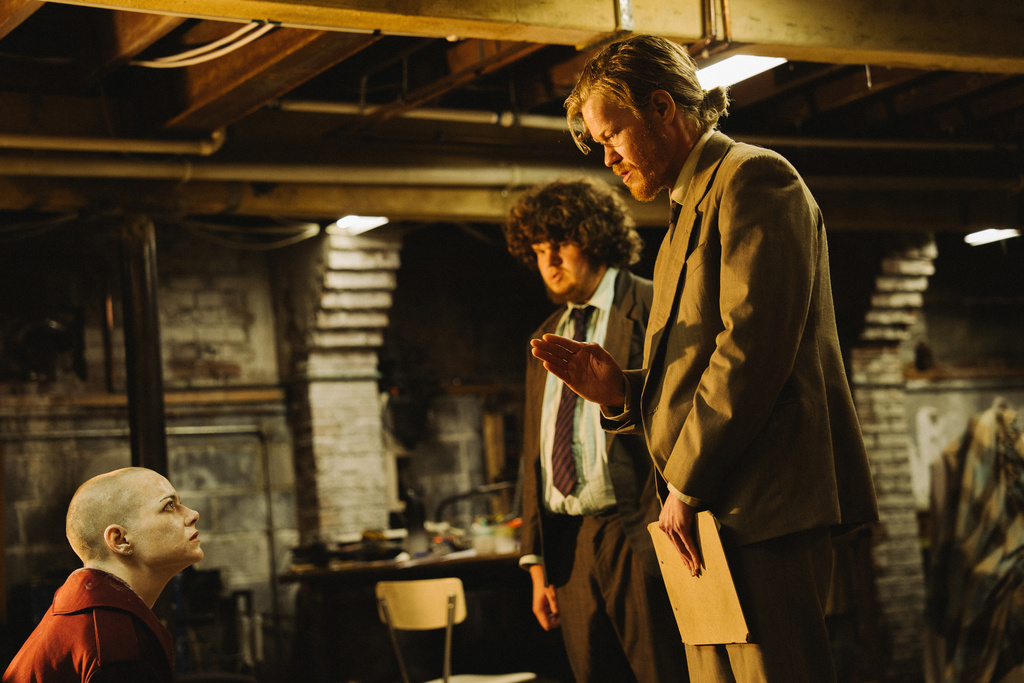 This image released by Focus Features shows Emma Stone, from left, Aidan Delbis, and Jesse Plemons in a scene from "Bugonia." (Atsushi Nishijima/Focus Features via AP)