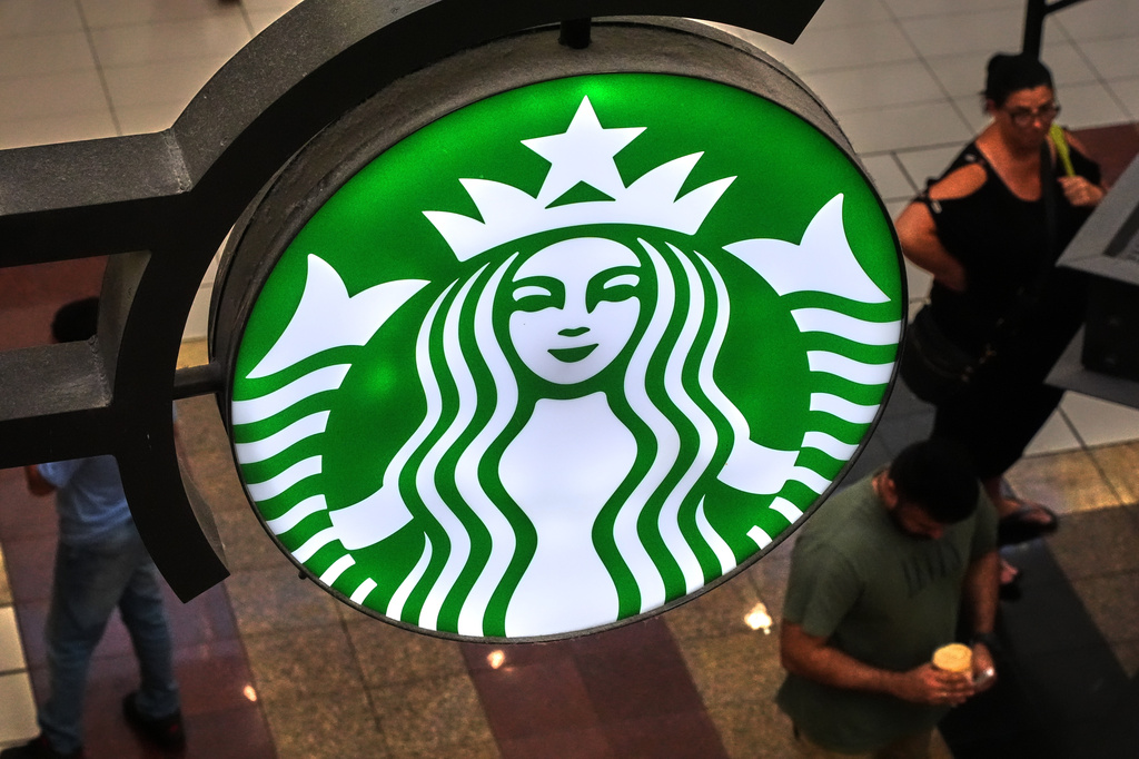 FILE - A Starbucks sign is displayed in the Galleria Mall in Buffalo, N.Y., Wednesday, Aug. 26, 2026. (AP Photo/Gene J. Puskar, File)