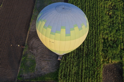 A hot air balloon lands in a farm on the west bank of the Nile River in Luxor, Egypt, Oct. 4, 2025. (AP Photo/Amr Nabil) A hot air balloon lands in a farm on the west bank of the Nile River in Luxor, Egypt, Oct. 4, 2025. (AP Photo/Amr Nabil)