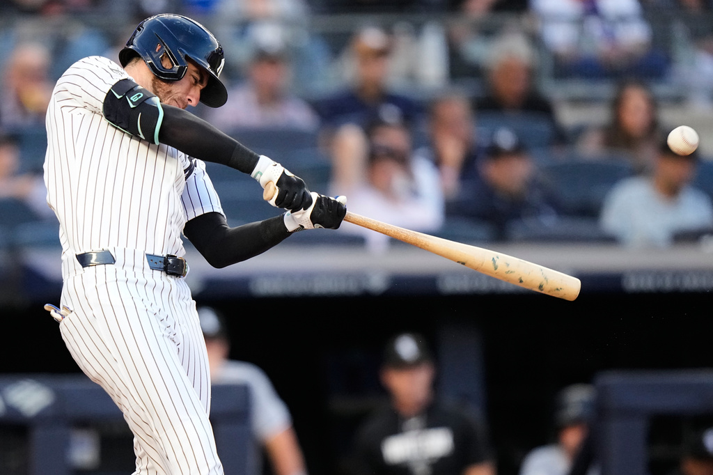 New York Yankees' Cody Bellinger hits a two-run home run during the first inning of a baseball game against the Chicago White Sox Wednesday, June 17, 2026, in New York. (AP Photo/Frank Franklin II)