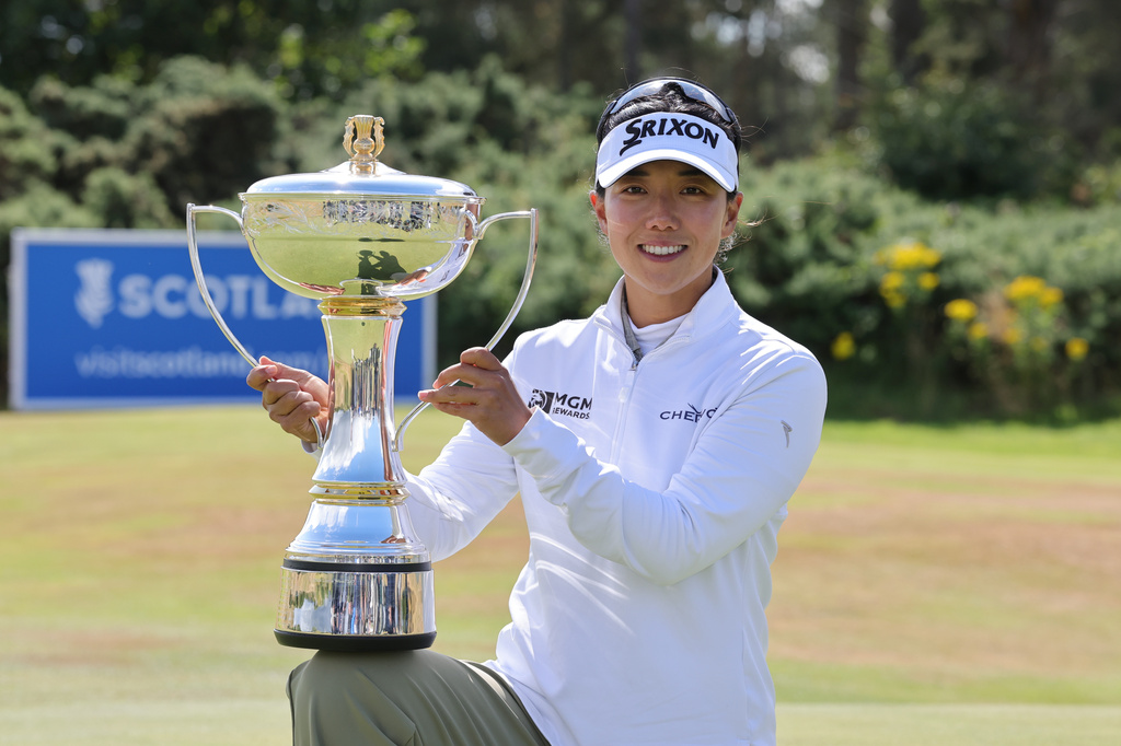 Jenny Shin of South Korea celebrates winning the 2026 ISPS HANDA Women's Scottish Open at Dundonald Links, Ayrshire, Sunday July 26, 2026. (Steve Welsh/PA via AP)