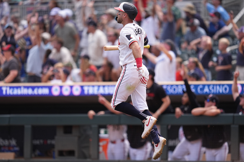 Minnesota Twins' Kody Clemens (2) celebrates after hitting a walk-off grand slam in the ninth inning of a baseball game against the Kansas City Royals, Thursday, July 30, 2026, in Minneapolis. (AP Photo/Abbie Parr)
