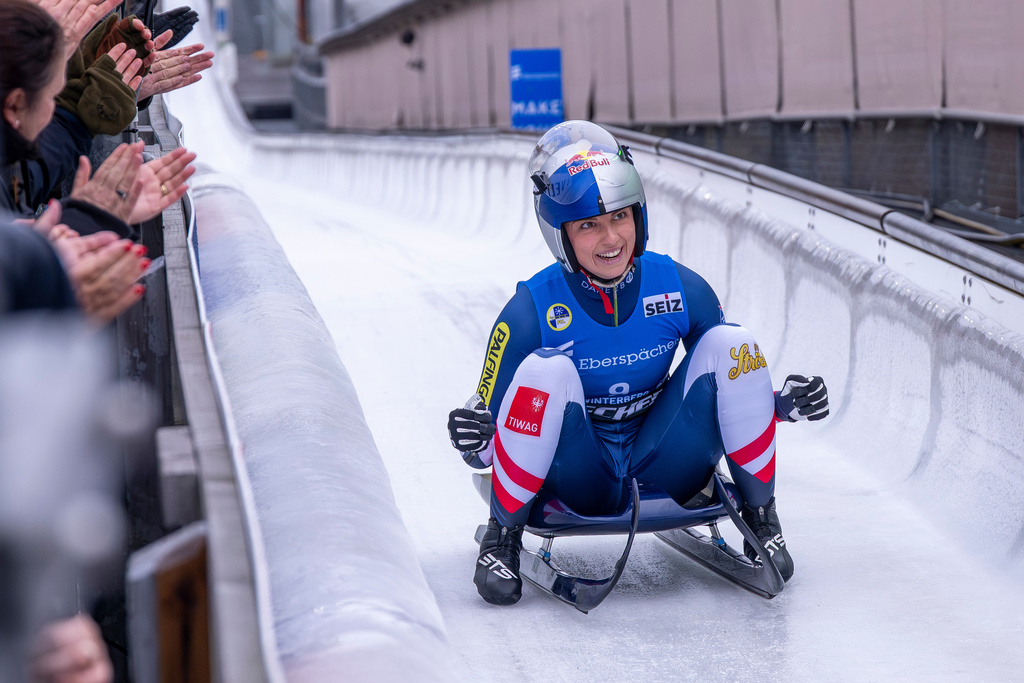 First placed Austria's Hannah Prock reacts after the women's single-seater Luge World Cup race in Winterberg, Germany, Sunday, Dec. 7, 2025. (David Inderlied/dpa via AP)