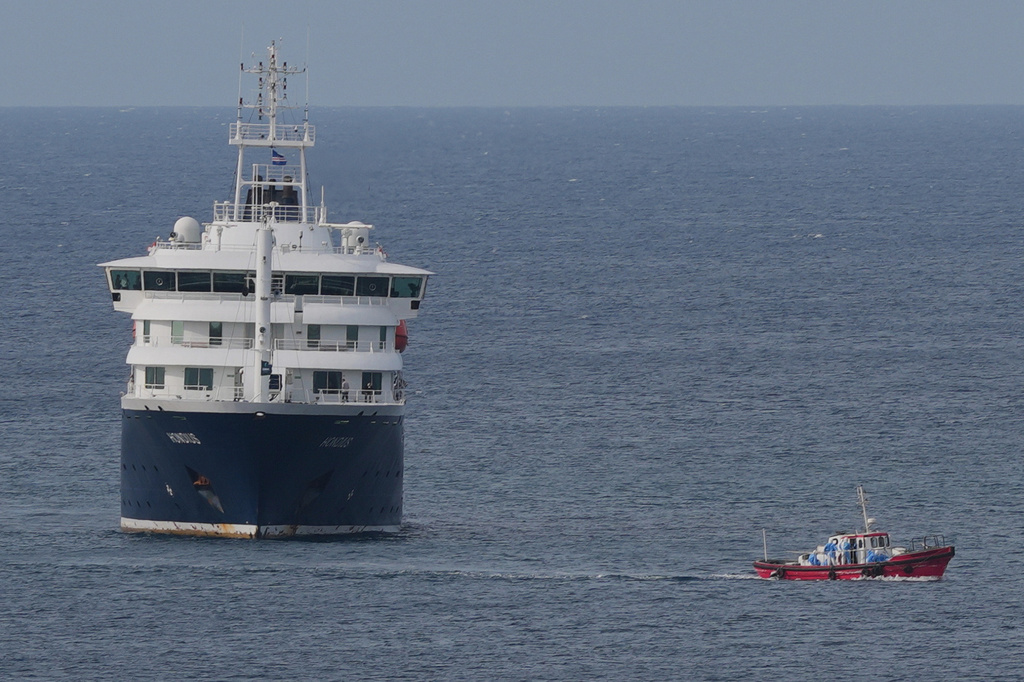 The MV Hondius cruise ship is anchored at a port in Praia, Cape Verde, Wednesday, May 6, 2026. (AP Photo/Misper Apawu)