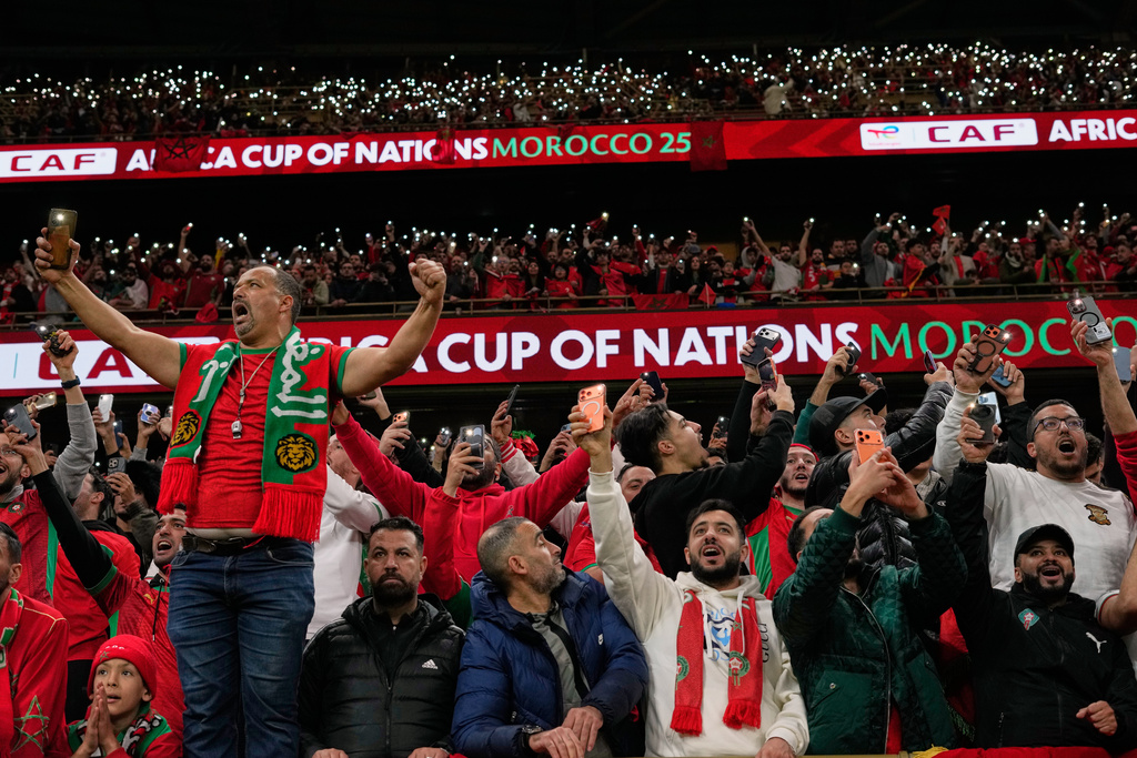 Morocco's fans celebrate during the Africa Cup of Nations group A soccer match between Zambia and Morocco in Rabat, Morocco, Monday, Dec. 29, 2025. (AP Photo/Themba Hadebe)
