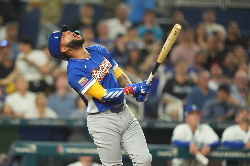 Venezuela Jackson Chourio reacts to a pop fly during the third inning of a World Baseball Classic semifinal game against Italy, Monday, March 16, 2026, in Miami. (AP Photo/Rebecca Blackwell)
