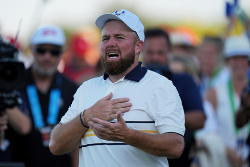 Europe's Shane Lowry celebrates after making the winning putt putt on the 18th hole during their singles match on the Bethpage Black golf course at the Ryder Cup golf tournament, Sunday, Sept. 28, 2025, in Farmingdale, N.Y. (AP Photo/Seth Wenig) Europe's Shane Lowry celebrates after making the winning putt putt on the 18th hole during their singles match on the Bethpage Black golf course at the Ryder Cup golf tournament, Sunday, Sept. 28, 2025, in Farmingdale, N.Y. (AP Photo/Seth Wenig)
