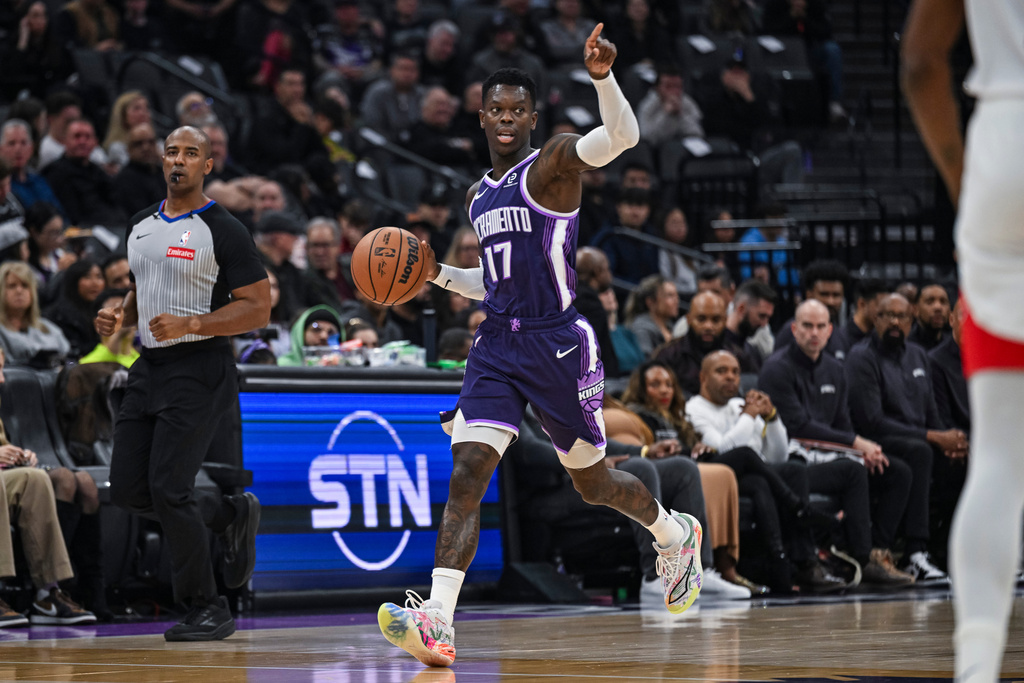 Sacramento Kings guard Dennis Schroder (17) calls a play during the first half an NBA basketball game against the Houston Rockets, Sunday, Dec. 21, 2025, in Sacramento, Calif. (AP Photo/Justine Willard)