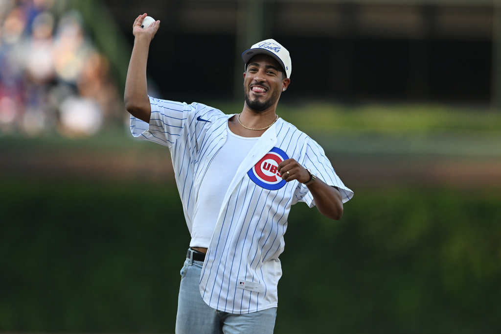 Indiana Pacers point guard Tyrese Haliburton throws out the ceremonial first pitch before a baseball game between the Chicago Cubs and Milwaukee Brewers in Chicago, Thursday, Sept. 3, 2026. (AP Photo/Paul Beaty)